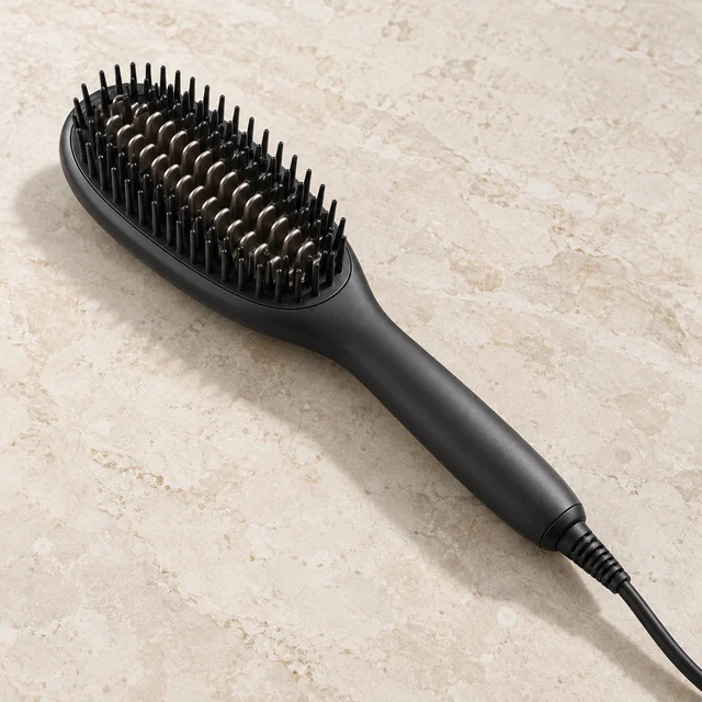 Heated straightening brush